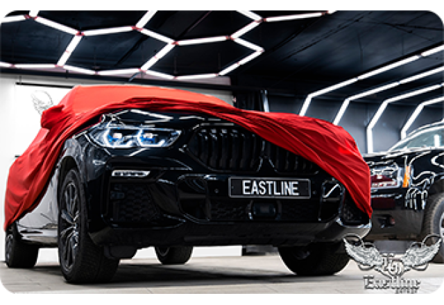 BMW X6 – пошив красного защитного чехла в Eastline Garage 