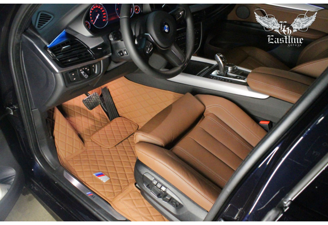 BMW X5 – премиальный комплект ковриков из экокожи с бортами.