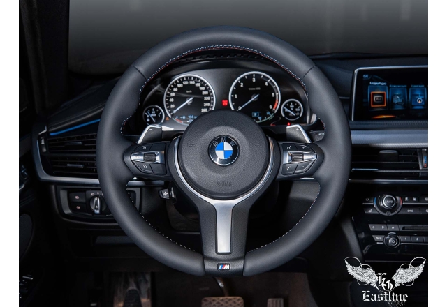 Перетяжка руля BMW X6 в тюнинг-ателье Eastline Garage