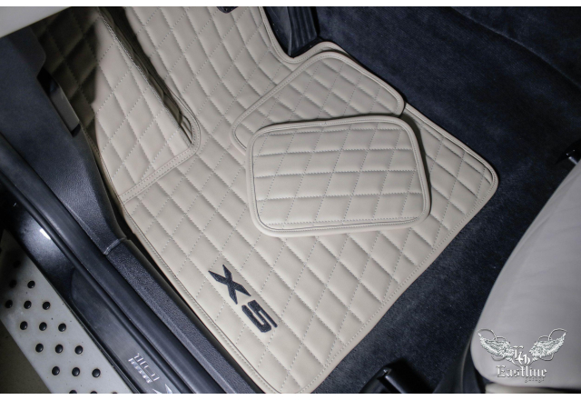 BMW X5 - пошив кожаного комплекта ковров для немецкого внедорожника