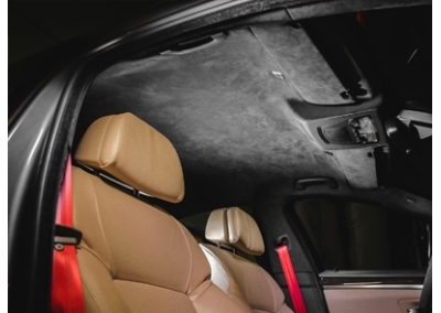 BMW 5-серии (F10) - перетяжка потолка в итальянскую алькантару, перетяжка руля в натуральную кожу и новые цветные ремни безопасности. 